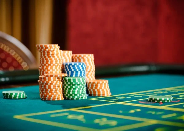 qqpek Live Casino studio with multi-camera setup and professional dealers